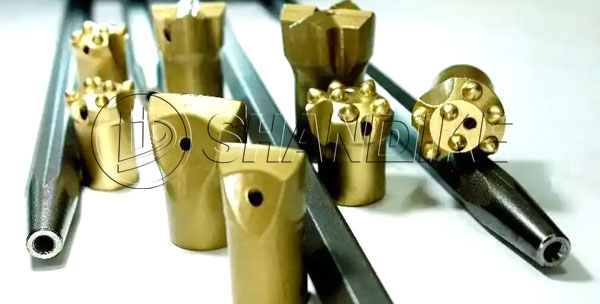 Comparison of Cold Pressing vs. Hot Stamping Technologies for Rock Drill Bits